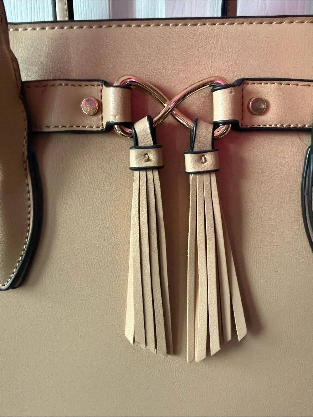 Structured Tan Tote Bag with Tassel Accent